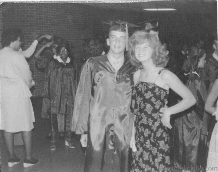 JMC 1978 - 3.JPG - High school graduatiion night with Robin Meyers.  John is wearing hisMarine Corps uniform on under graduation gown 1978